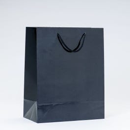 Busta lusso plastificata nero lucido L26 x P13 x A32cm - Pack da 12 Busta lusso plastificata nero lucido L26 x P13 x A32cm - Pack da 12